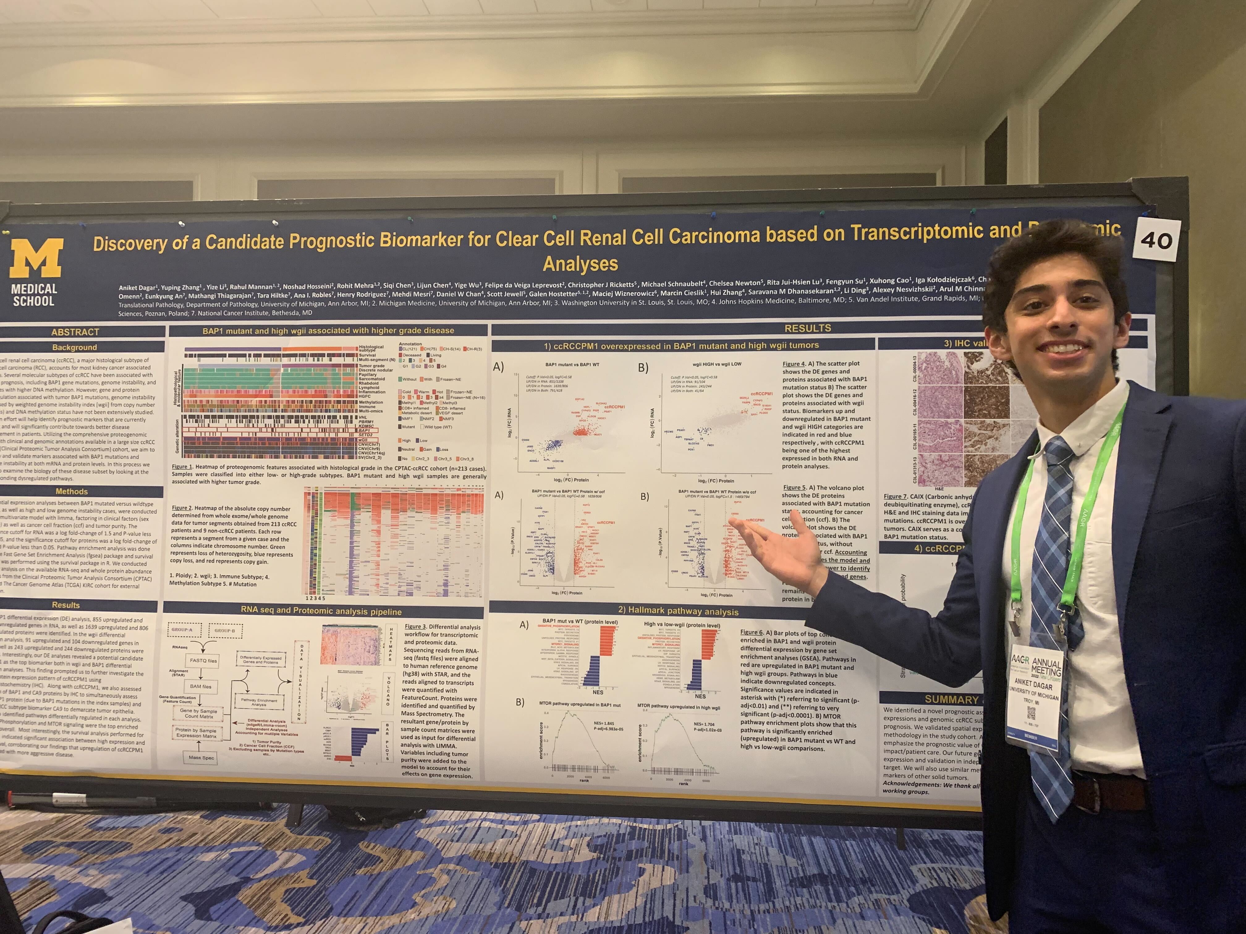 Aniket Dagar presenting his AACR poster.